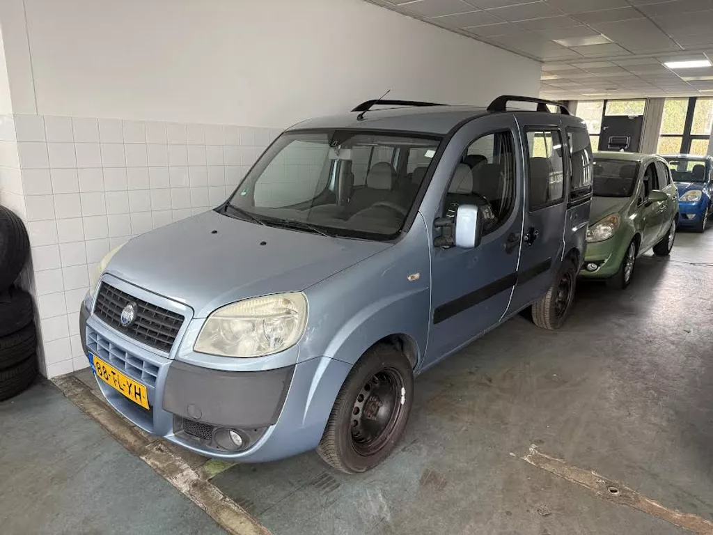 Fiat Doblo 1.4 57KW 2 X schuif deuren - NAP - 7 PERSOONS