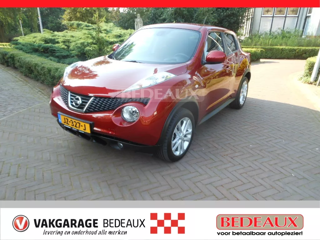 NISSAN Juke 1.6 117pk Tekna bij Vakgarage® met 12 maanden BOVAG  garantie