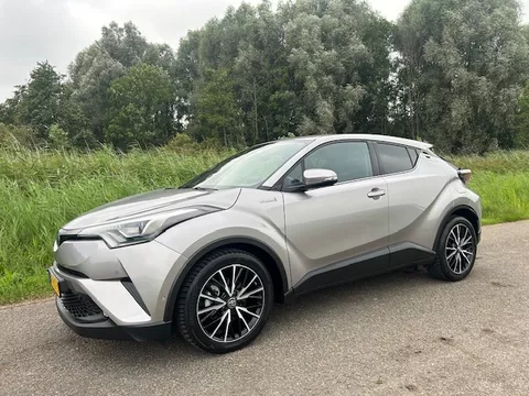 TOYOTA C-Hr 1.8 Hybrid 122pk CVT Executive | Navigatie | Camera | Dashcam | Cruise control | JBL Sound | Half leder | Stoelverwarming | NAP | Rijklaar prijs!