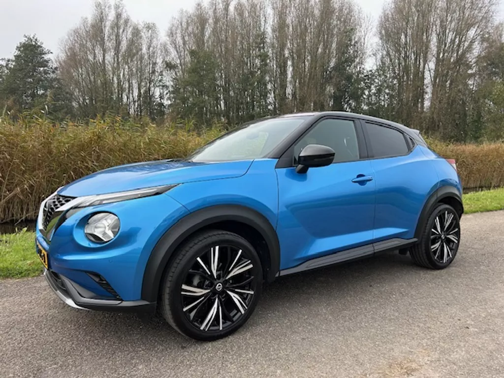 NISSAN Juke 1.0 DIG-T 114pk N-Design | Navigatie | Apple carplay/ Android auto | Camera | Pdc V+A | BOSE | Half leder/ Alcantara | Two-tone lak | Rijklaar prijs!