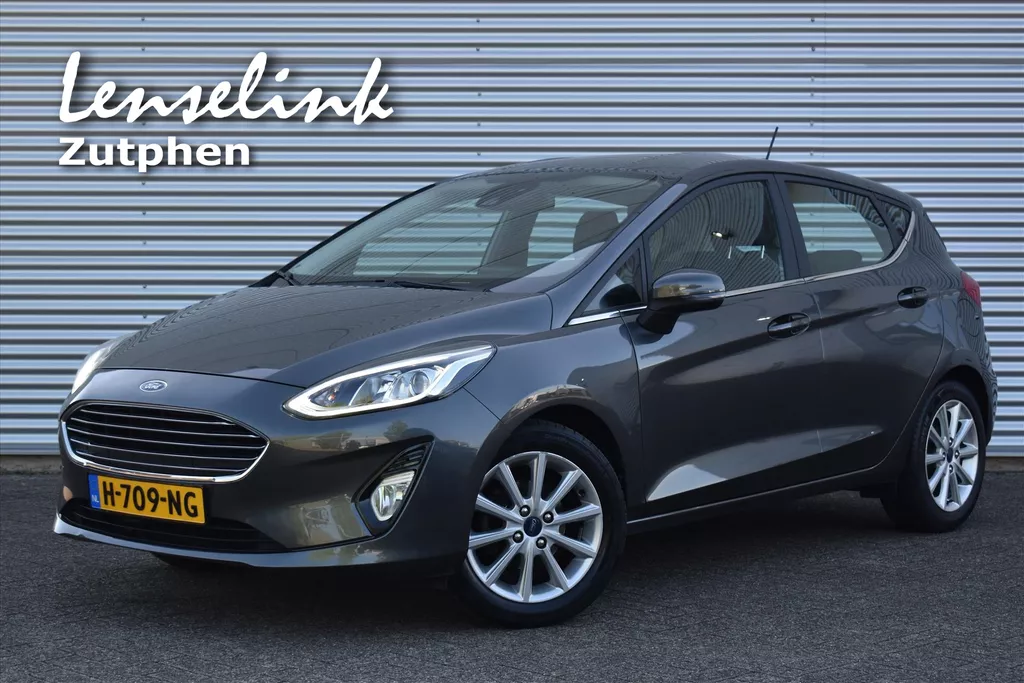 Ford Fiesta 1.0 EcoBoost 100PK Titanium | Dealeronderhouden | Carplay | Cruise Control | Climate Control | LED dagrijverl. | Incl. BOVAG garantie, beurt, APK etc.